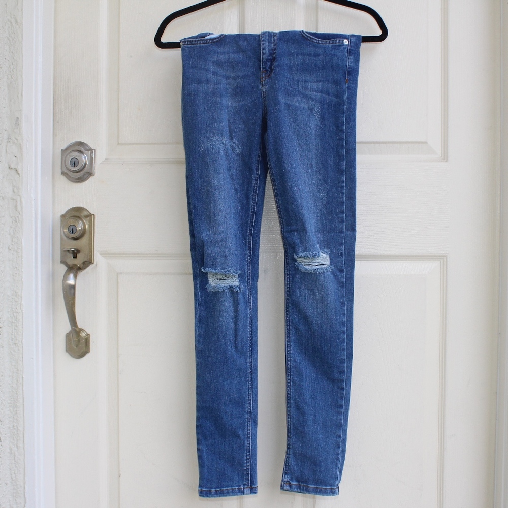 Distressed Blue Jeans